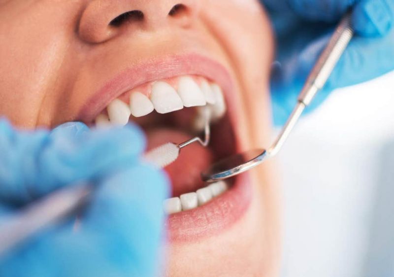 Dentist performing general dental check-up at Rajarhat Dental Hall